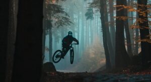 Man on Mountain Bike in Forest